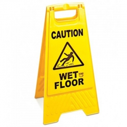 Табличка попереджає “УВАГА! ВОЛОГА ПІДЛОГА"